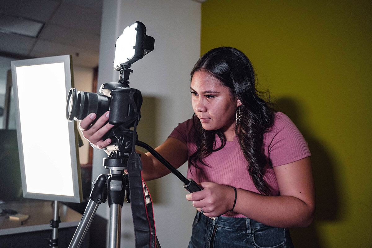 woman using camera